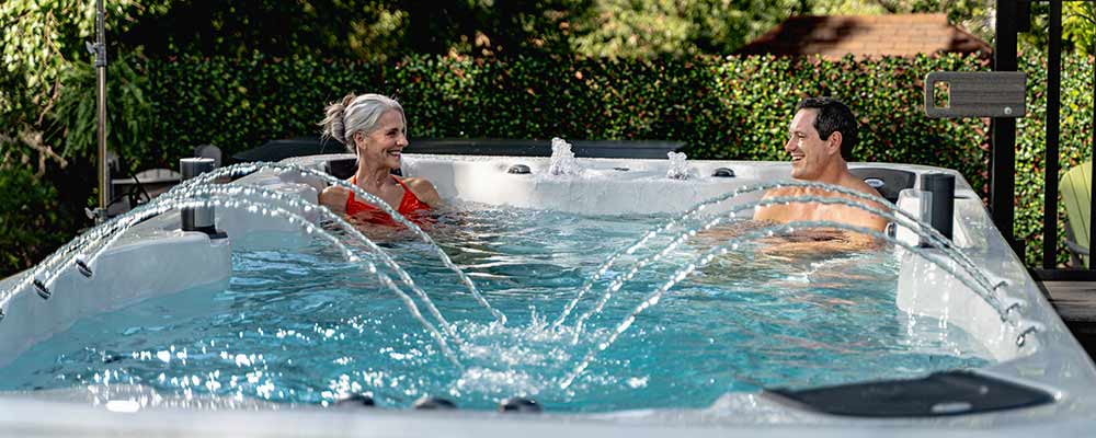 Couple enjoying their hot tub